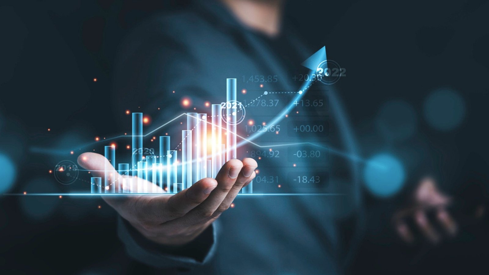 a man holding a business card with a graphing bar chart